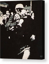 Load image into Gallery viewer, Protestor yells to the photographer during an arrest 1968 - Canvas Print